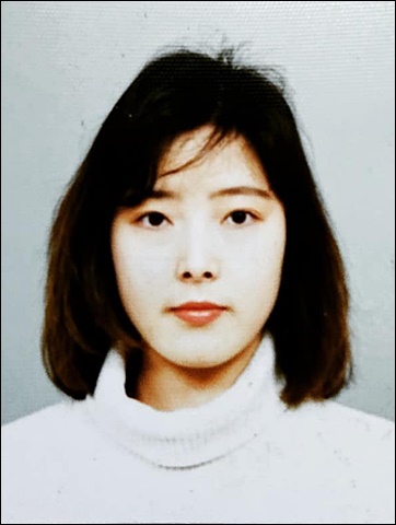 橋本潮、1995年のパスポート写真
